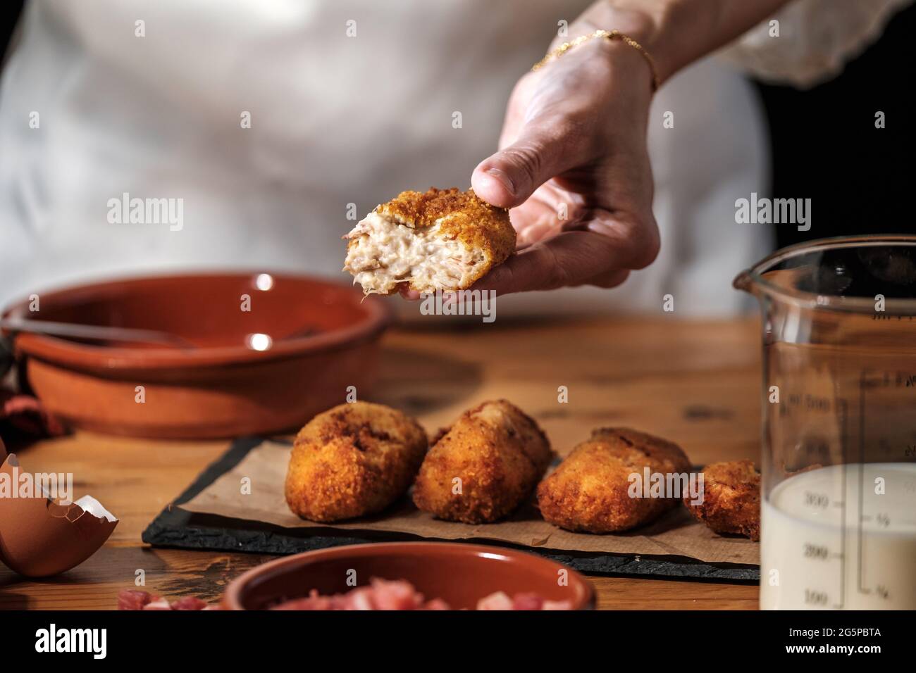 Homemade ham croquette, typical Spanish cuisine recipe, bechamel sauce