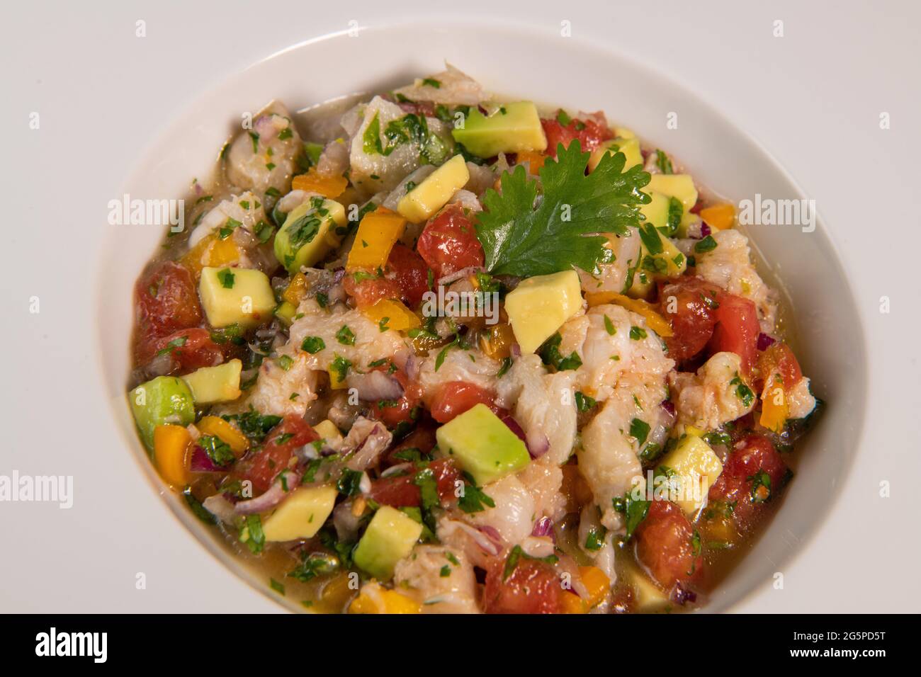 Cod Ceviche recipe, bread in oil and garlic Stock Photo - Alamy