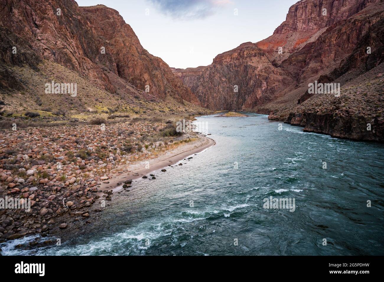 Morning Light Turns the Colorado River Blue in the Bottom of the Grand Canyon Near Phantom Ranch Stock Photo