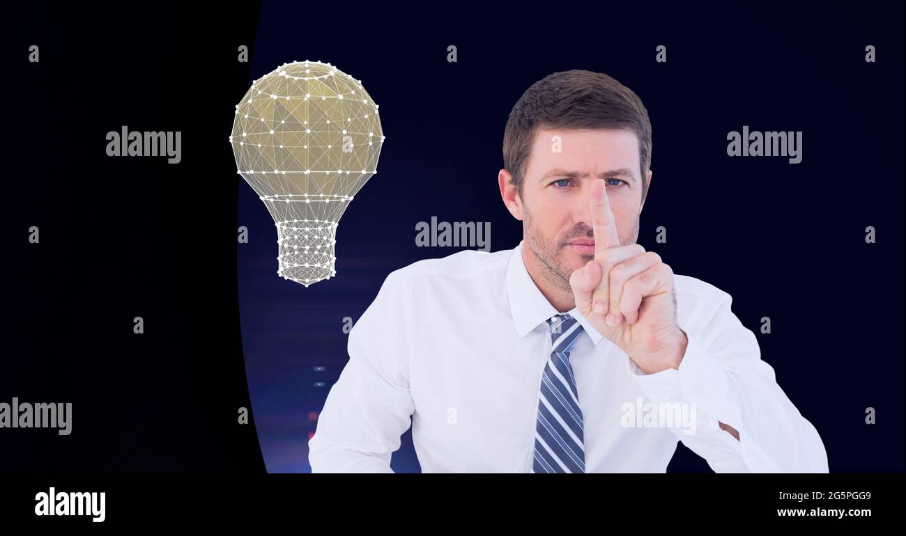 Composition of businessman touching interactive screen with lightbulb Stock Photo