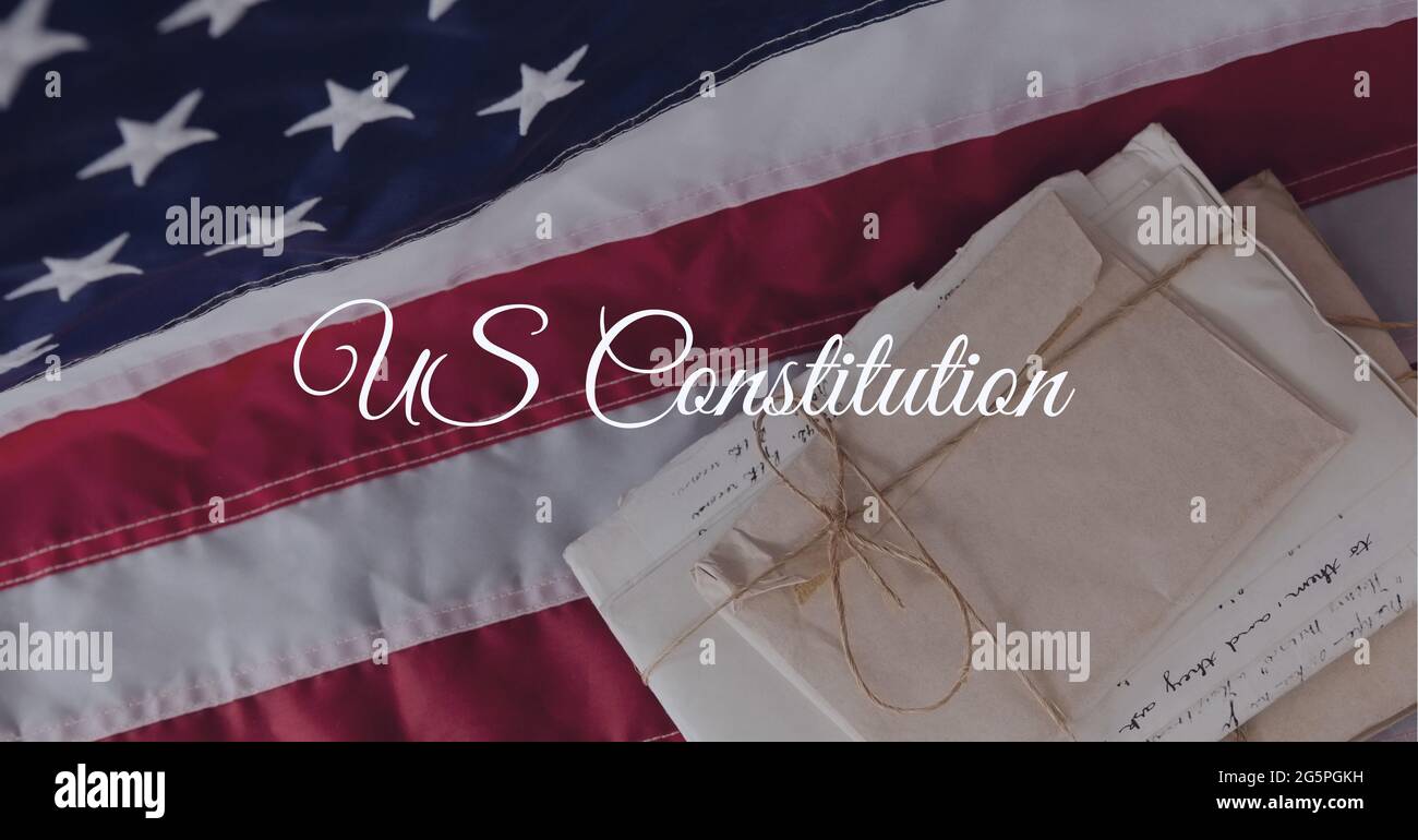 Composition of text us constitution, over antique documents and american flag Stock Photo