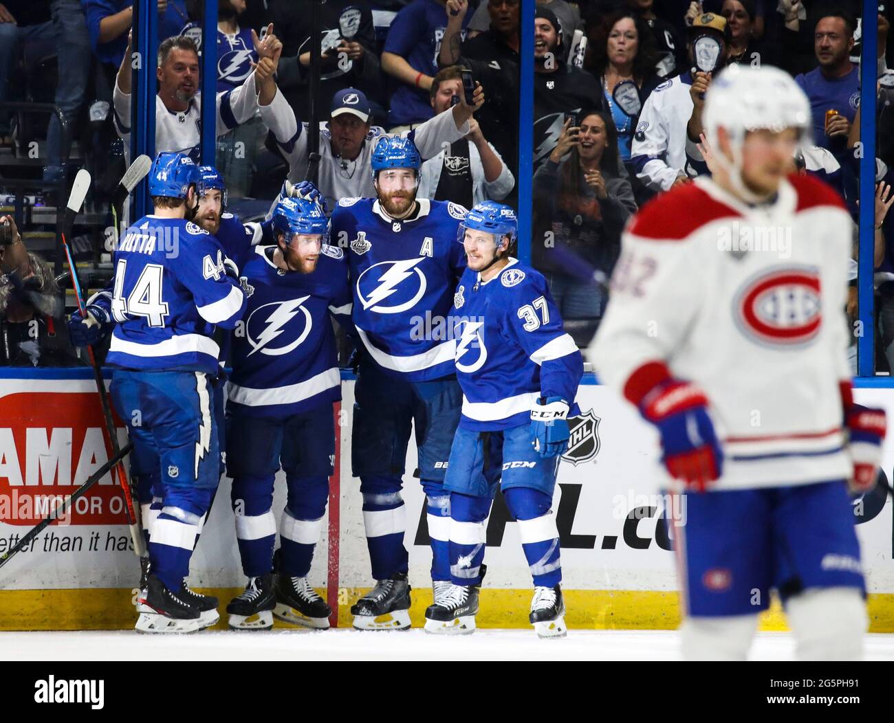 Tampa Bay Lightning defenseman Jan Rutta (44), left, center Blake