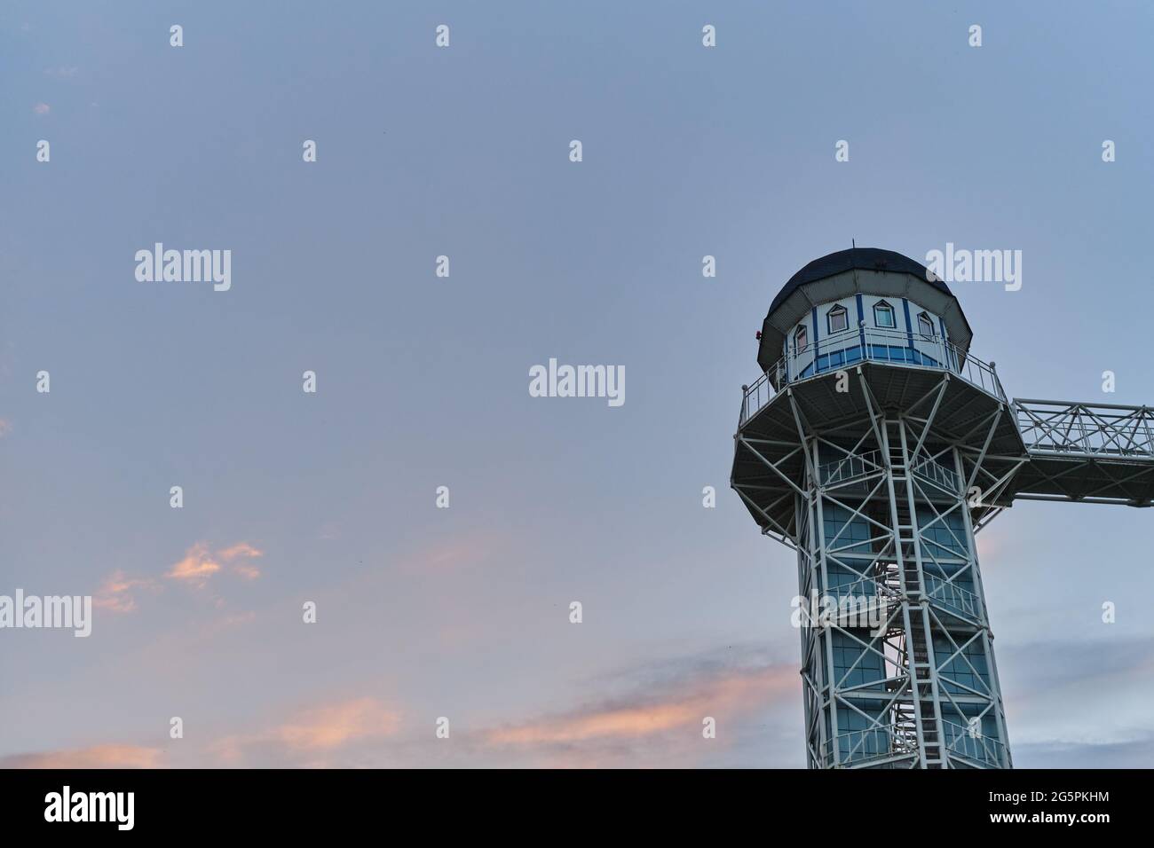 Unusual lighthouse with Windows view from below. Minimalist landscape ...