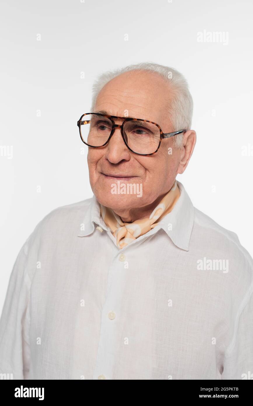 portrait of smiling elderly man in glasses isolated on white Stock Photo