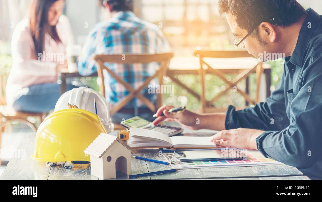 Engineering Project Image Civil Engineer Team holding blueprint plan for project on site working ...