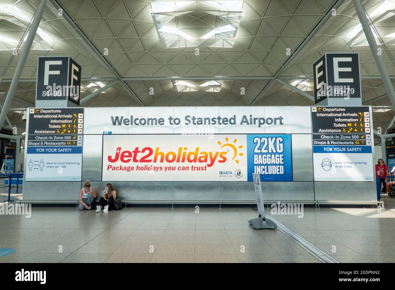 Picture dated June 3rd shows a very quiet Stansted Airport in Essex on Friday afternoon with only a few passengers flying to Europe as travel restrictions remain.  The airport is likely to remain quiet for at least the next 3 weeks as countries remain on  the Amber and Red  List and Portugal is reported to be removed down to amber. Stock Photo