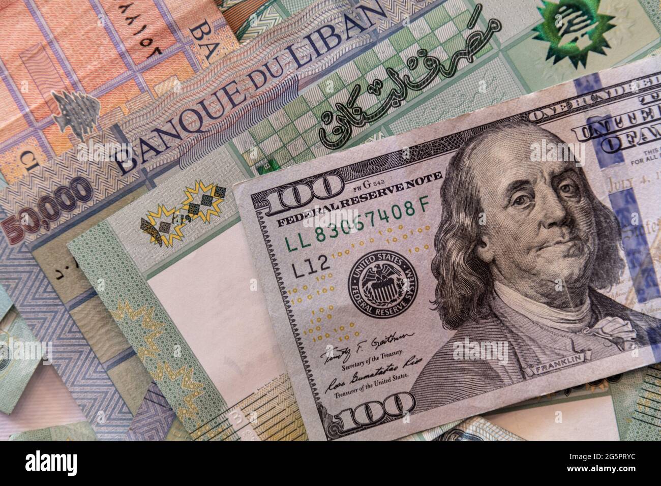 Lebanese Lira (Lebanese Pound) currency with 100 USD - The Lebanese  currency has lost more than 90 percent of its value since October 2019  Stock Photo - Alamy