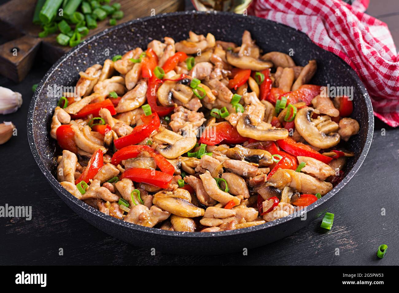 Stir fry with chicken, mushrooms and sweet peppers Chinese food Stock