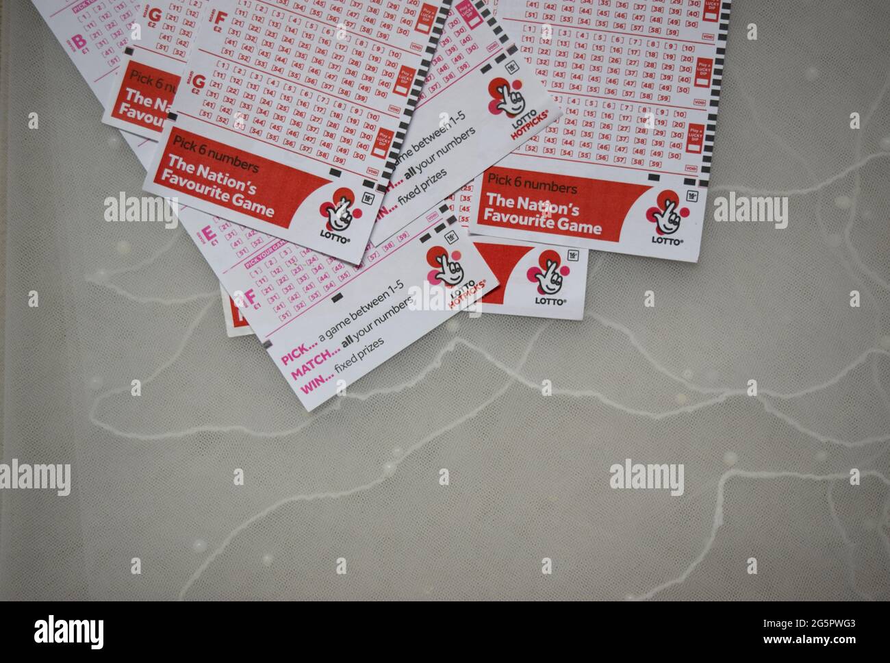 UK National lottery slips with numbers on light background Stock Photo
