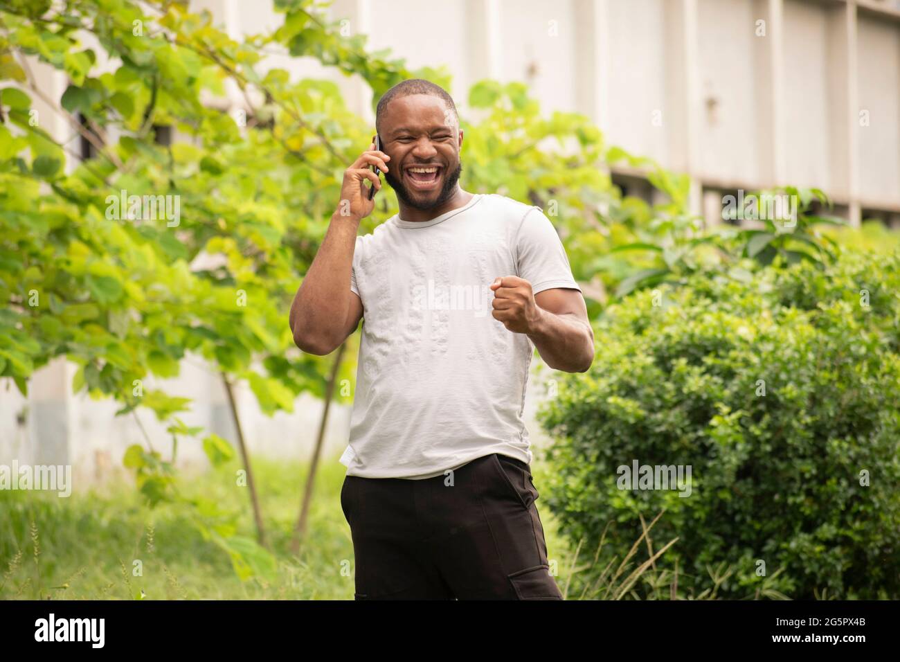 a young man receiving a phone call Stock Photo