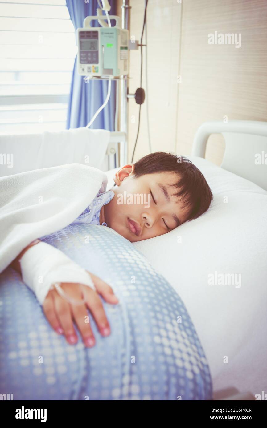 Iv Sleep Injection Illness asian boy sleeping at modern and comfortable equipped hospital ...