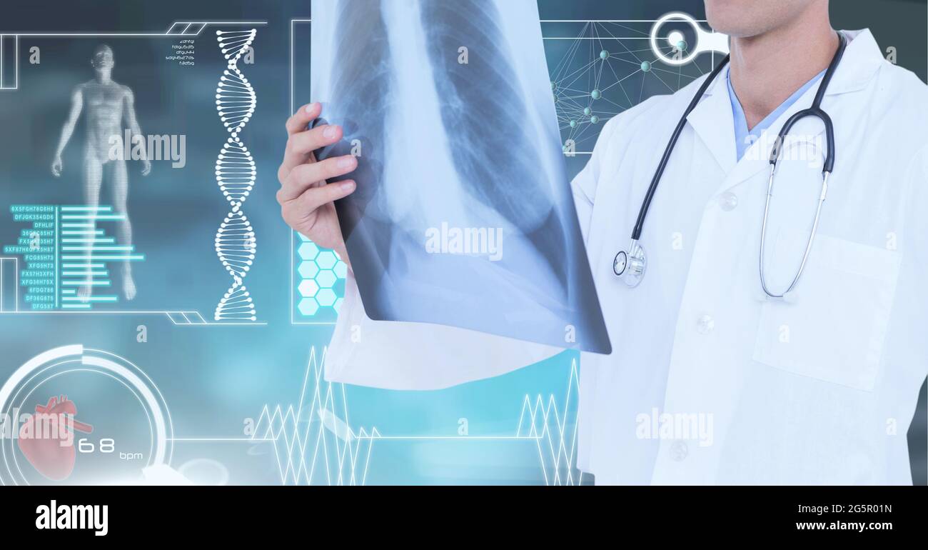 Medical data processing against mid section of male doctor examining x ...