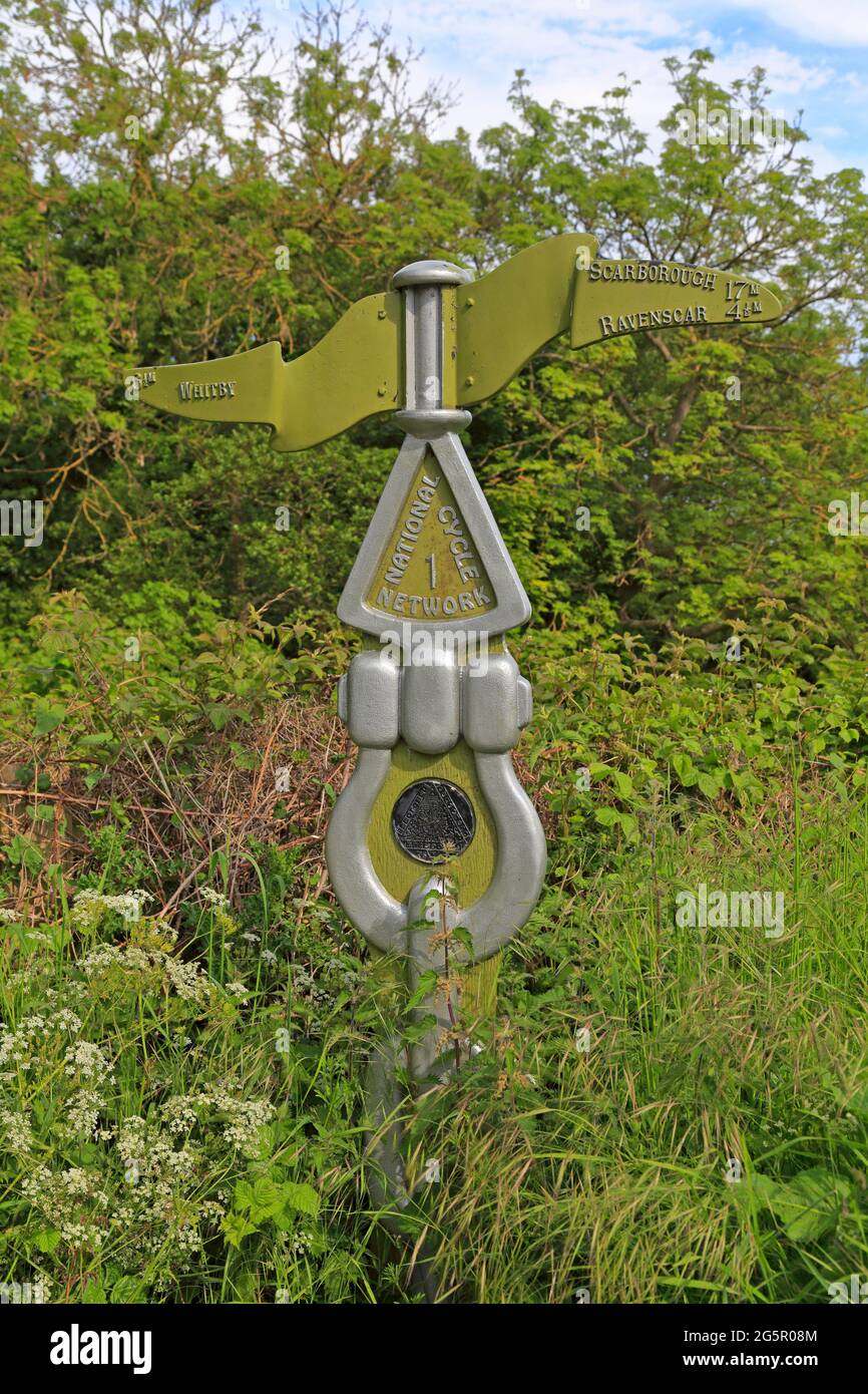 Sustrans milepost on the National Cycle Network 1 in Robin Hoods Bay in the North York Moors National Park, North Yorkshire, England, UK. Stock Photo