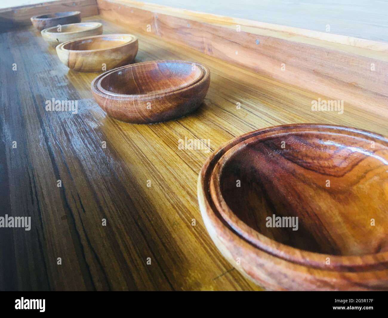 wooden hand engraved tea pots Stock Photo