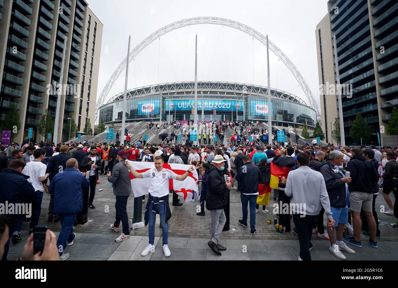 Fans watch the UEFA Euro 2020 round of 16 match between England and Germany at the 4TheFans fan zone outside Wembley Stadium. Picture date: Tuesday June 29, 2021. Stock Photo