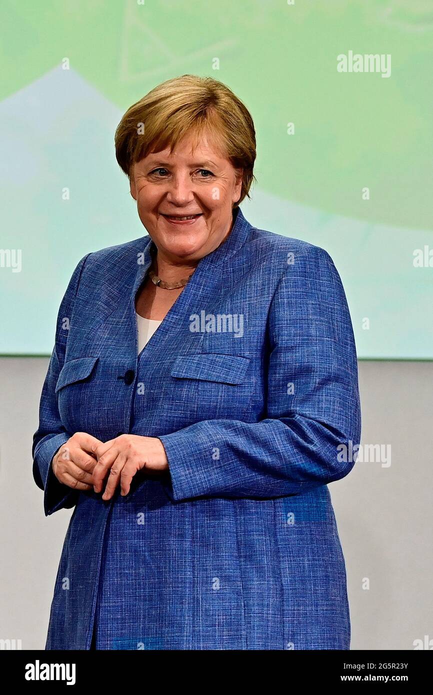 German Chancellor Angela Merkel reacts after having been awarded with Harnack Medal, the highest award presented by the Max Planck Society for services to society, at Humboldt Carre in Berlin, Germany June 29, 2021. Tobias Schwarz/Pool via REUTERS Stock Photo