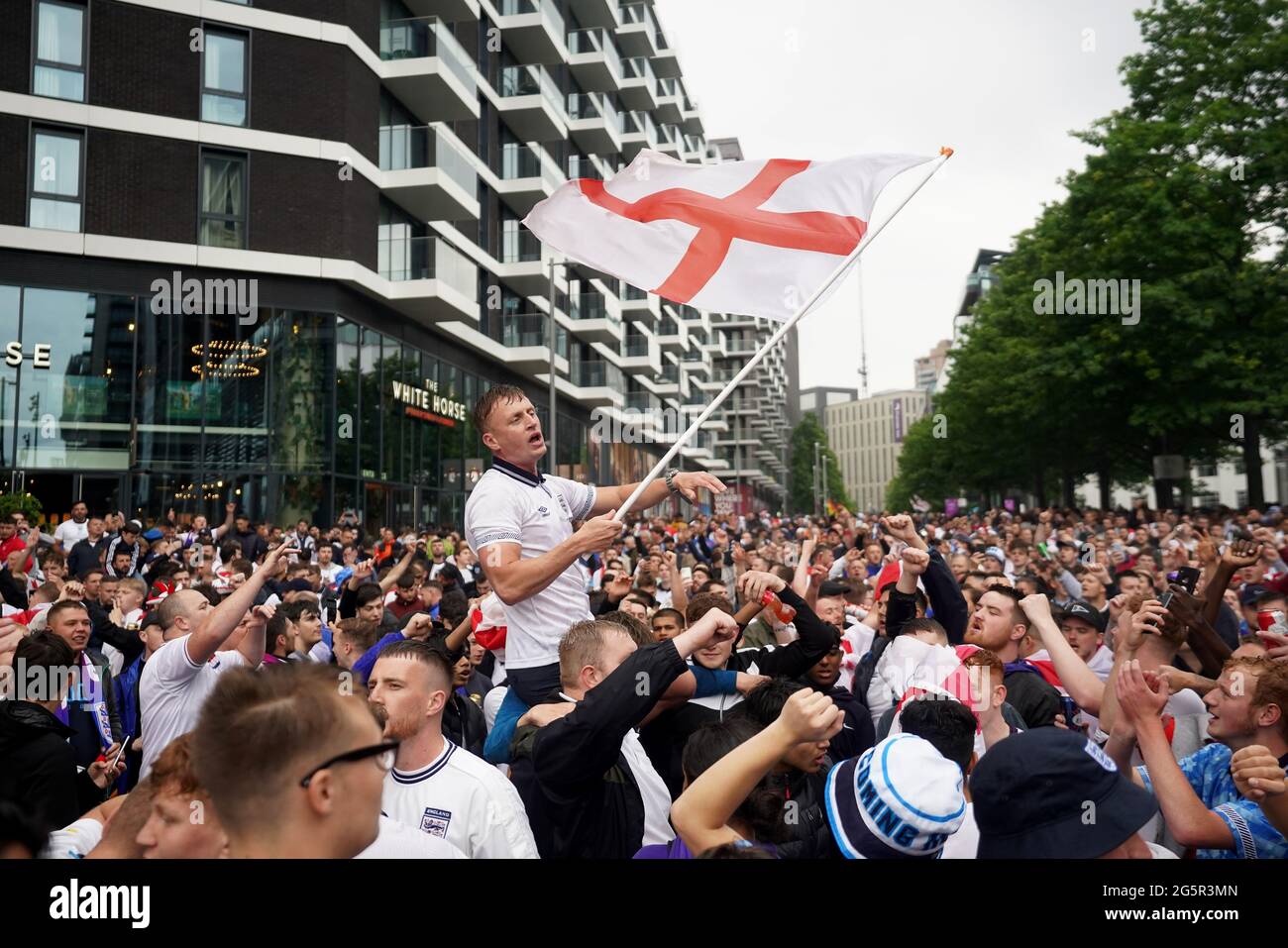 Fans arrive to watch the UEFA Euro 2020 round of 16 match between England and Germany at the 4TheFans fan zone outside Wembley Stadium. Picture date: Tuesday June 29, 2021. Stock Photo