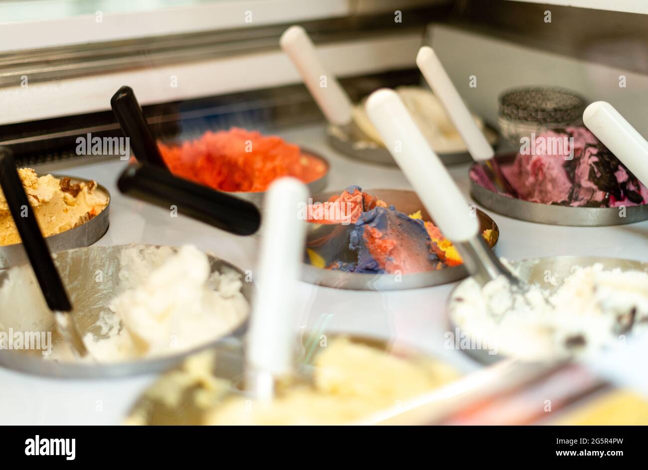Closeup of ice cream assortment in showcase fridge Stock Photo