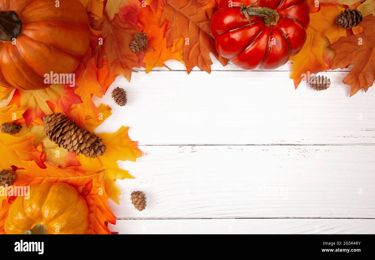 Fall Border Background on a White Wood Surface Stock Photo - Alamy