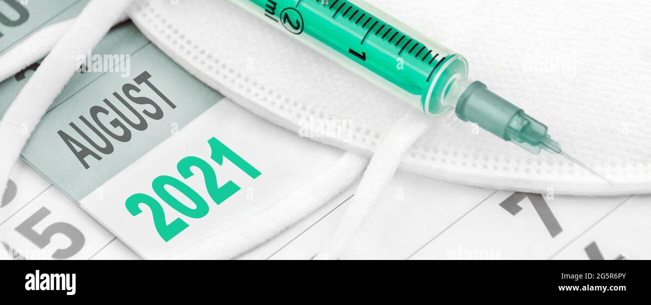 Calendar August 2021 with FFP2 Mask and Vaccination Stock Photo