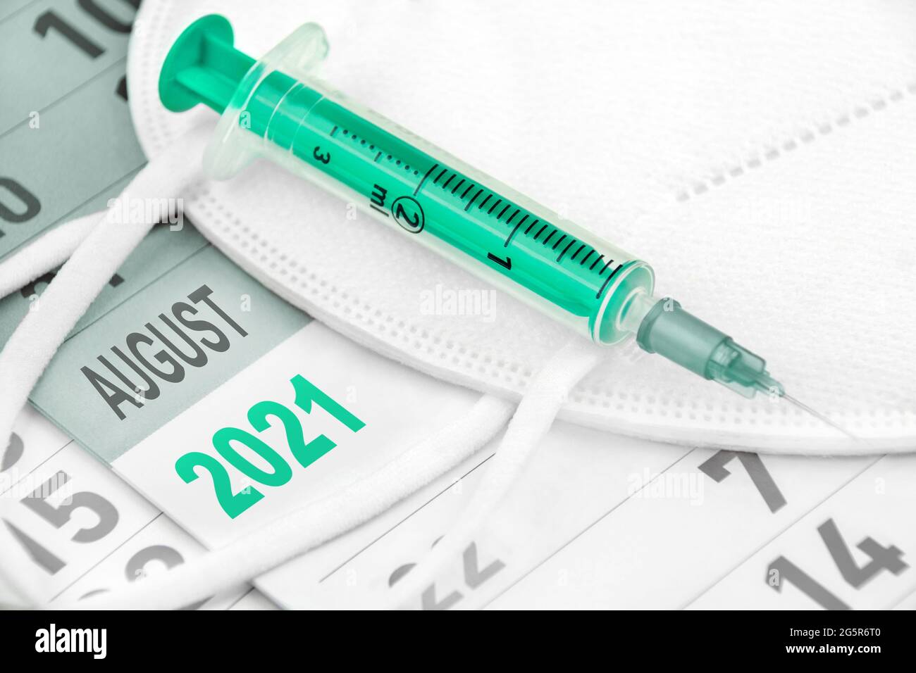 Calendar 2021 with FFP2 Mask and Vaccination Stock Photo