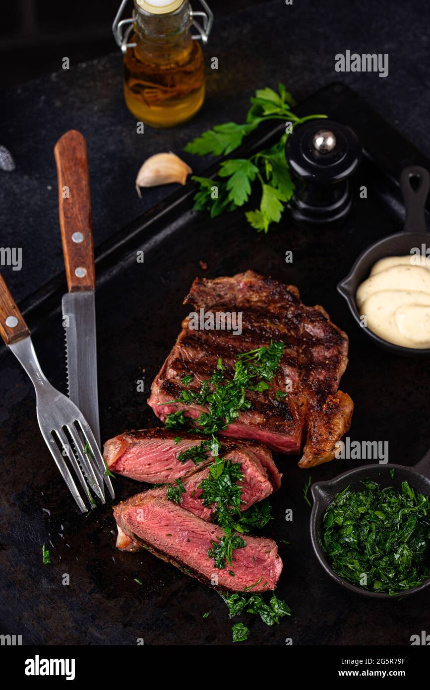 Well Marbles Ribeye Grilled marbled rib eye steak Stock Photo - Alamy