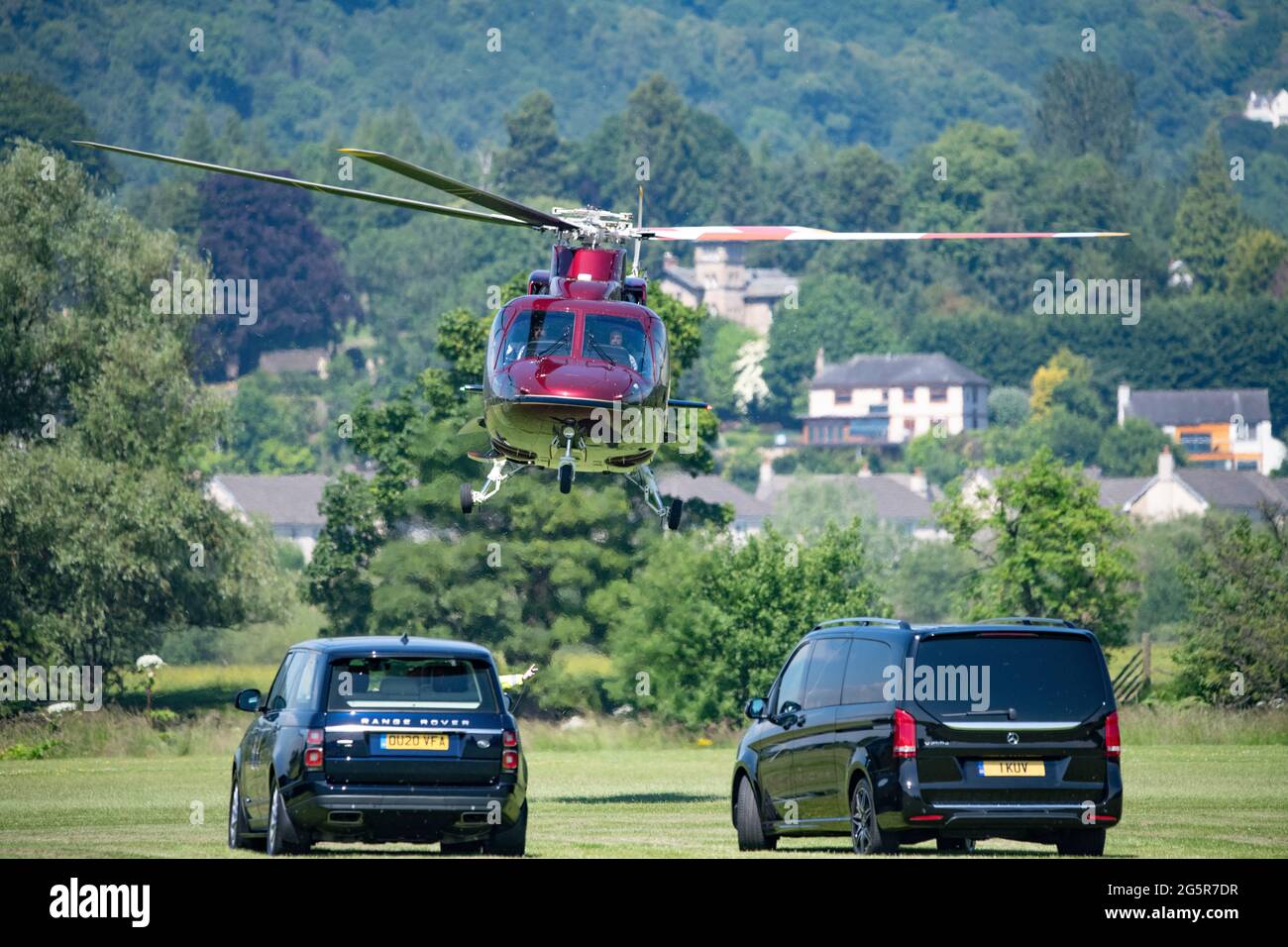 Stirling, Scotland, UK. 29th June, 2021. PICTURED: Her Majesty The Queen Elizabeth II flies in on her private Sikorsky helicopter (registered: XXEB) on the hottest day this year landing at Stirling Rugby ground, on route to Stirling Castle for the reopening of The Argyle and Sutherland Highlander's Museum at Stirling Castle. The Royal standard was flying whilst she was at the castle. Credit: Colin Fisher/Alamy Live News Stock Photo