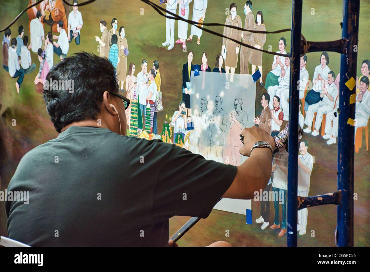 Bangkok, Thailand 04.07.2021 Asian artist restoring traditional painting Stock Photo