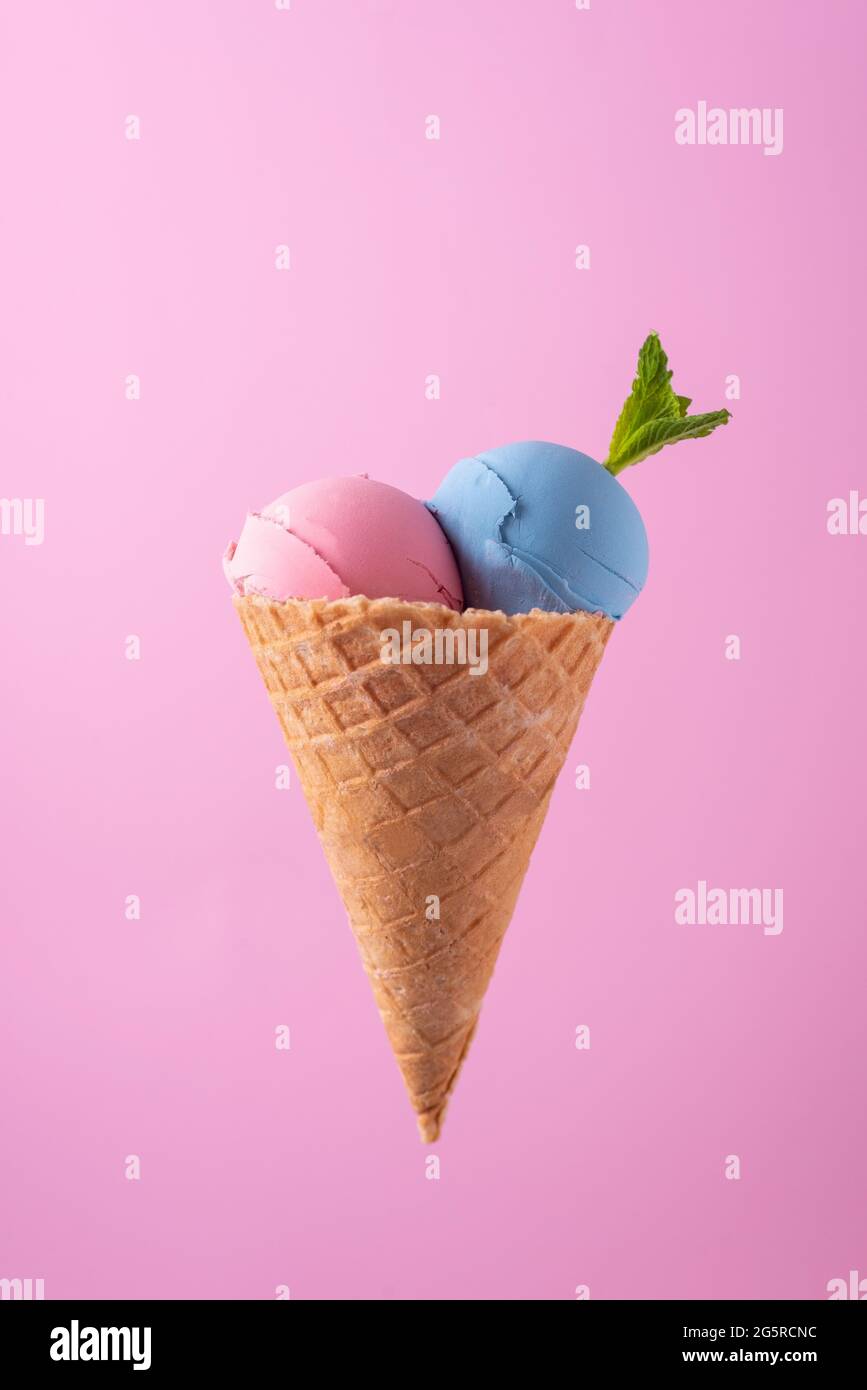 ice cream in waffle cone on pink background minimalistic concept Stock ...