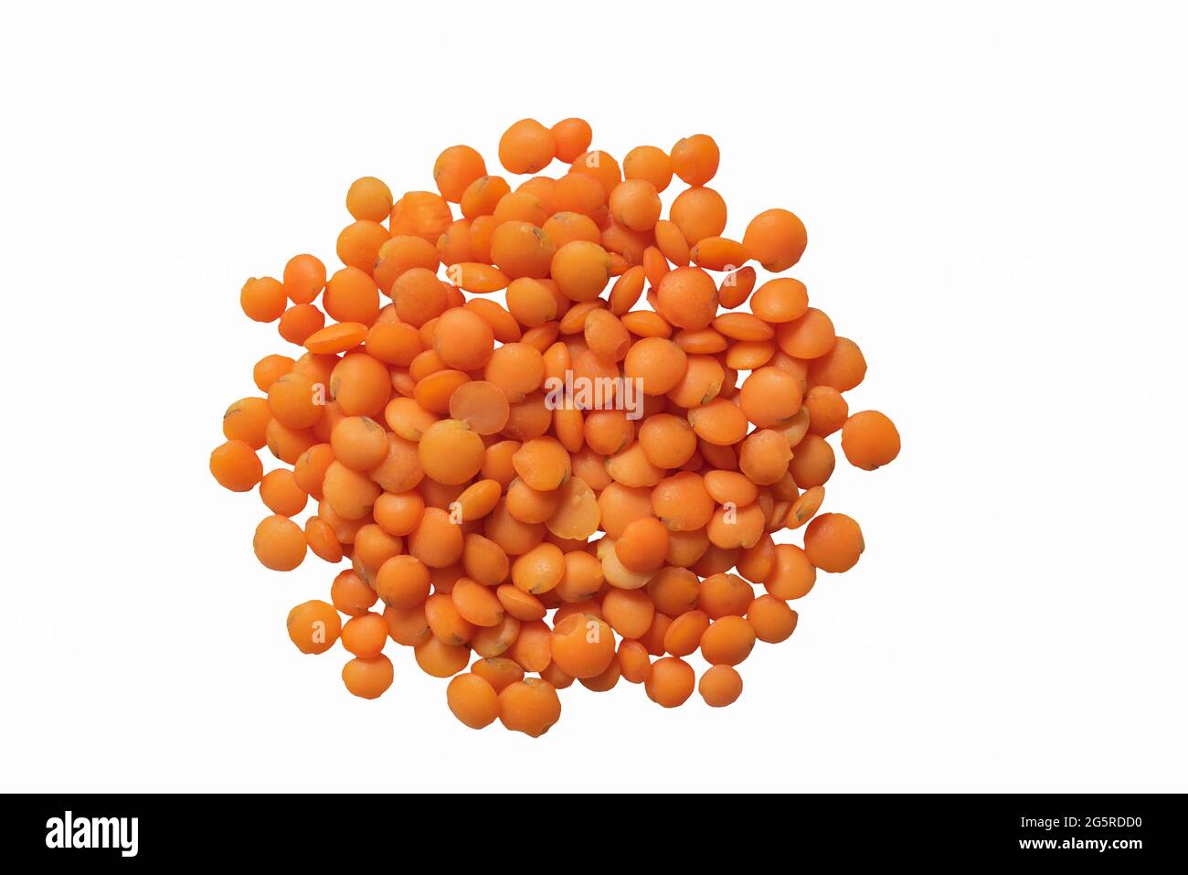 Heap of dry red lentils isolaated on white background. Natural organic
