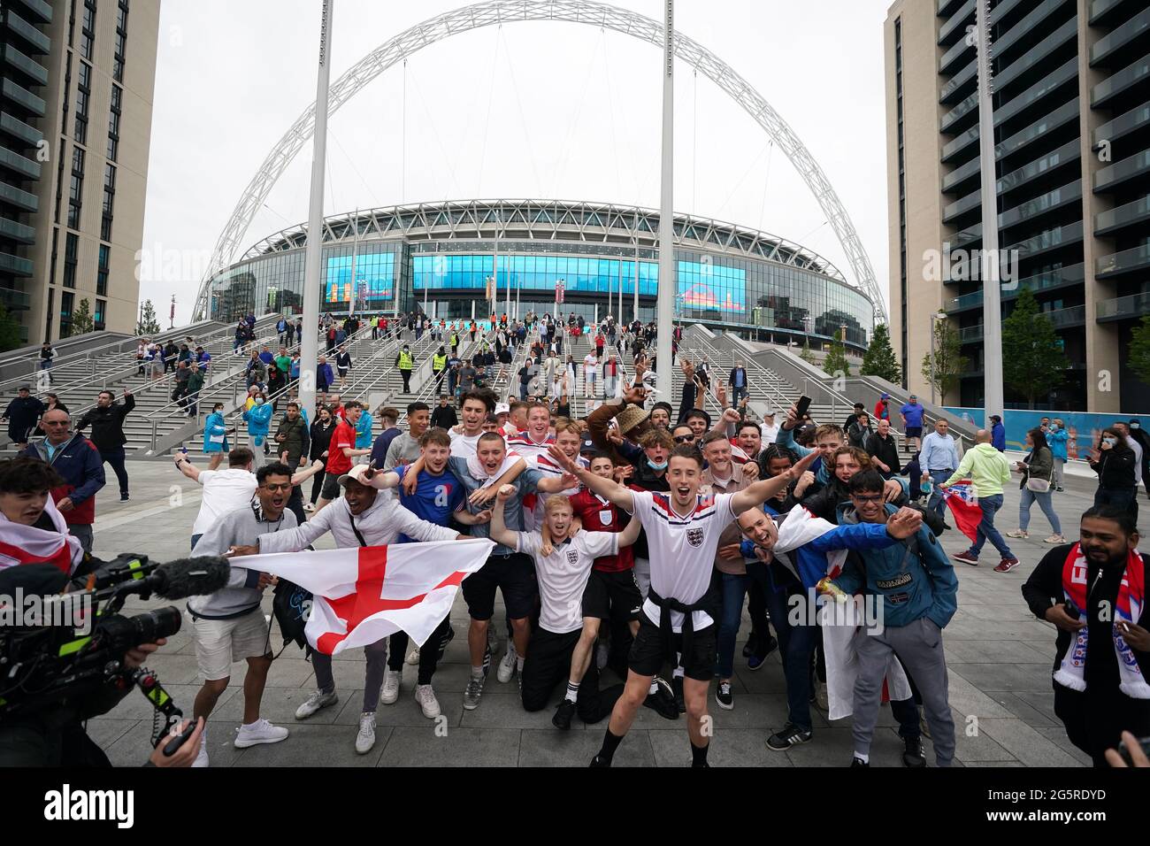 Fans celebrate the UEFA Euro 2020 round of 16 match between England and Germany at the 4TheFans fan zone outside Wembley Stadium. Picture date: Tuesday June 29, 2021. Stock Photo