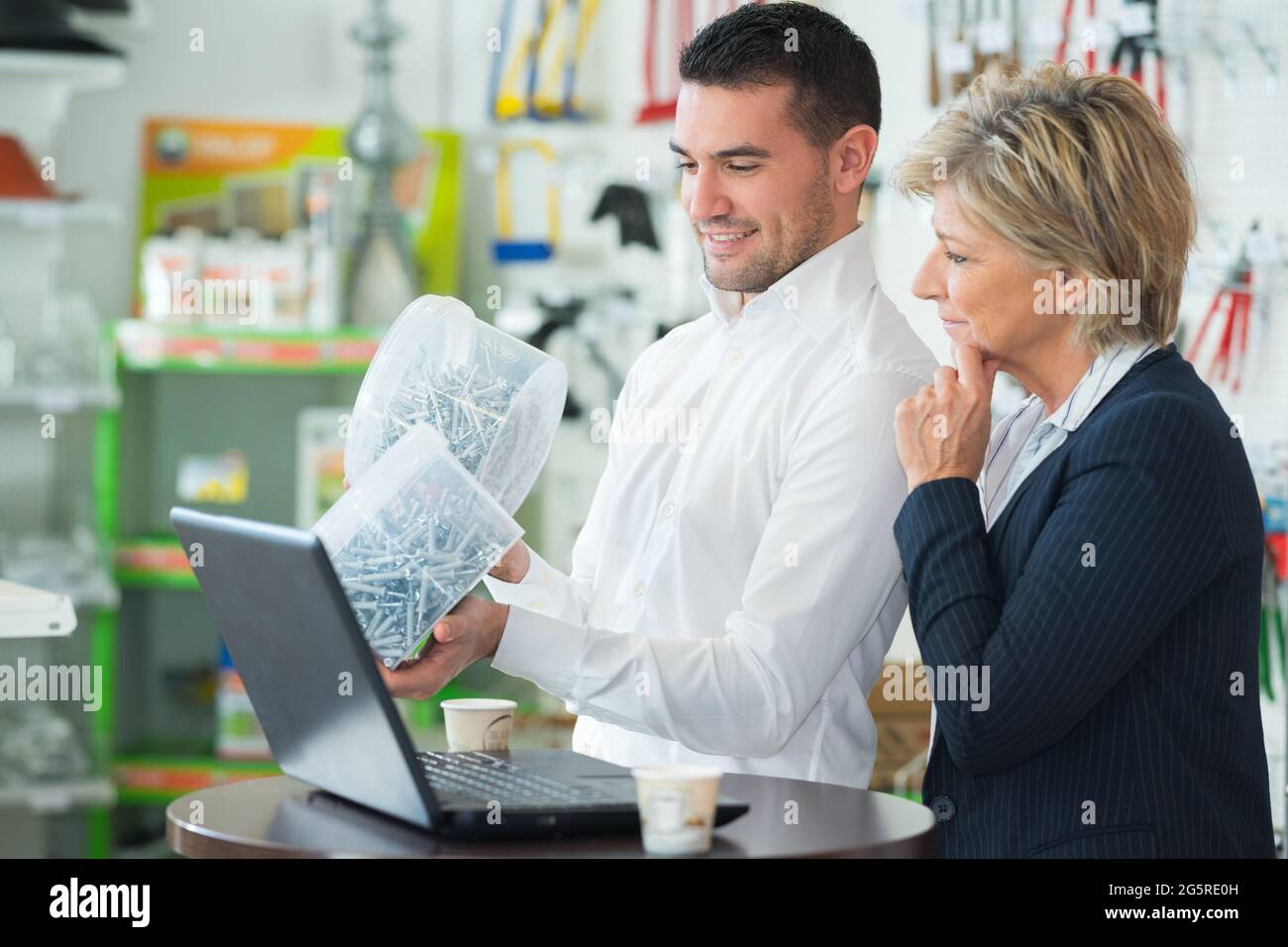 Woman pointing man to door hi-res stock photography and images - Alamy