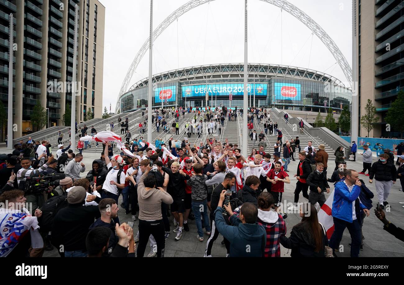 Fans celebrate the UEFA Euro 2020 round of 16 match between England and Germany at the 4TheFans fan zone outside Wembley Stadium. Picture date: Tuesday June 29, 2021. Stock Photo