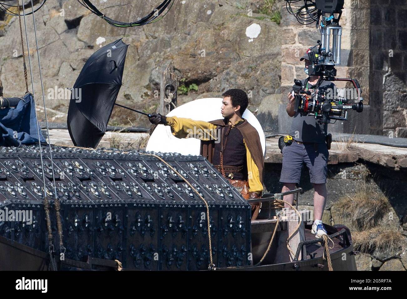 Justice Smith during filming for the Dungeons and Dragons film at Carrickfergus Castle in Northern Ireland. Stock Photo