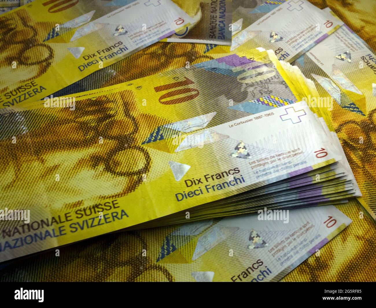 Money of Switzerland. Swiss franc bills. CHF banknotes. 10 francs. Business, finance, news background. Stock Photo
