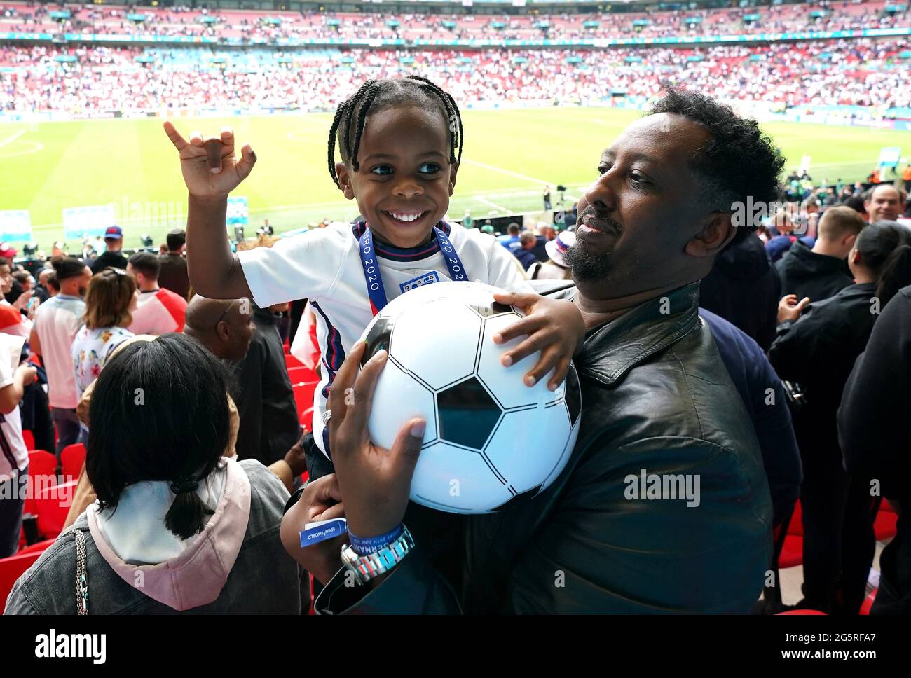 England's Raheem Sterling son Thiago celebrates with family after the final  whistle during the UEFA Euro 2020 round of 16 match at Wembley Stadium,  London. Picture date: Tuesday June 29, 2021 Stock Photo - Alamy