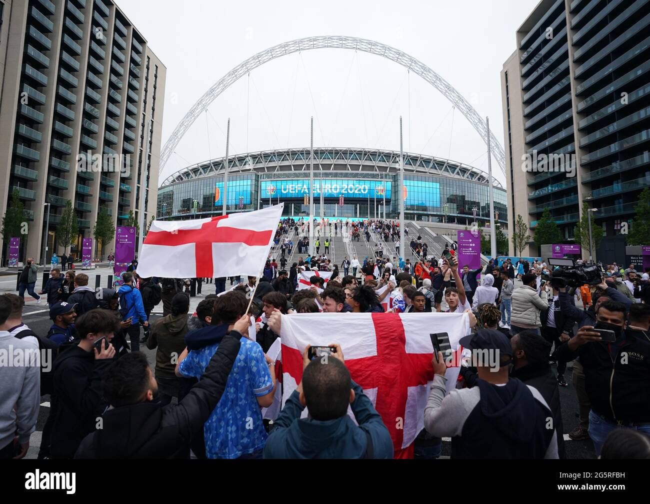Fans celebrate following the UEFA Euro 2020 round of 16 match between England and Germany at the 4TheFans fan zone outside Wembley Stadium. Picture date: Tuesday June 29, 2021. Stock Photo