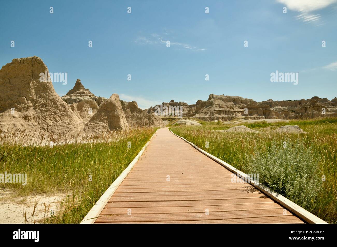 Boardwalk among the Rock Formations, Chadron Formations, in the Badlands National Park Eroded Buttes and Pinnacles in South Dakota, USA Stock Photo