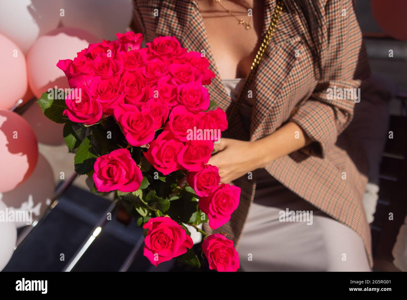 Woman holds luxury bouquet of red roses Stock Photo - Alamy