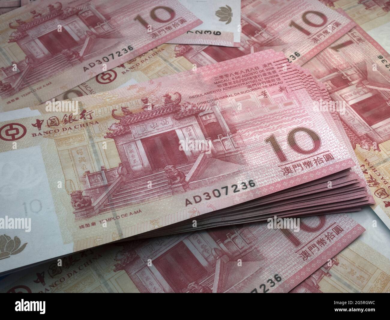 Money of Macao. Macanese pataca bills. MOP banknotes. 10 patacas. Business,  finance, news background Stock Photo - Alamy