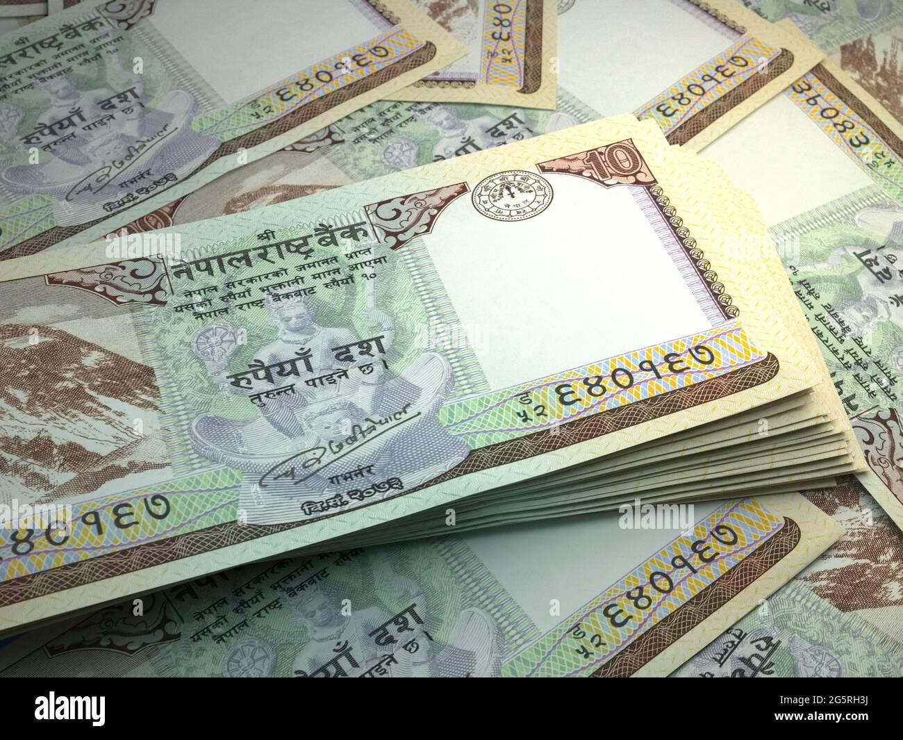 Money of Nepal. Nepalese rupee bills. NPR banknotes. 10 Rs. Business