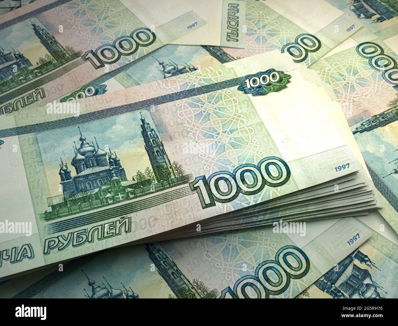 Money of Russia. Russian ruble bills. RUB banknotes. 1000 rubles. Business,  finance, news background Stock Photo - Alamy