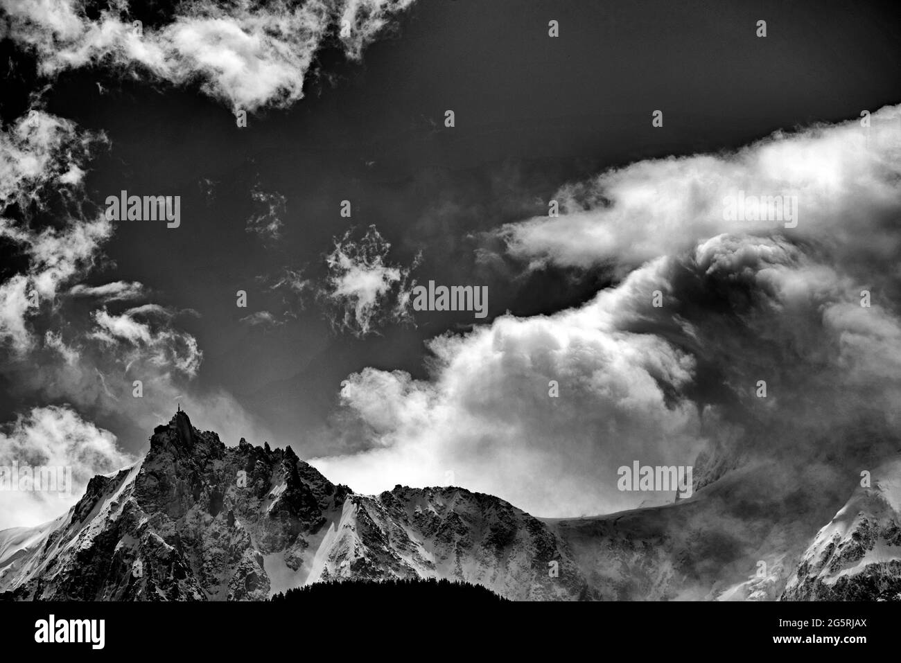 France, Haute-Savoie (74), Alps, Aiguille du midi (3842m) and clouds Stock Photo