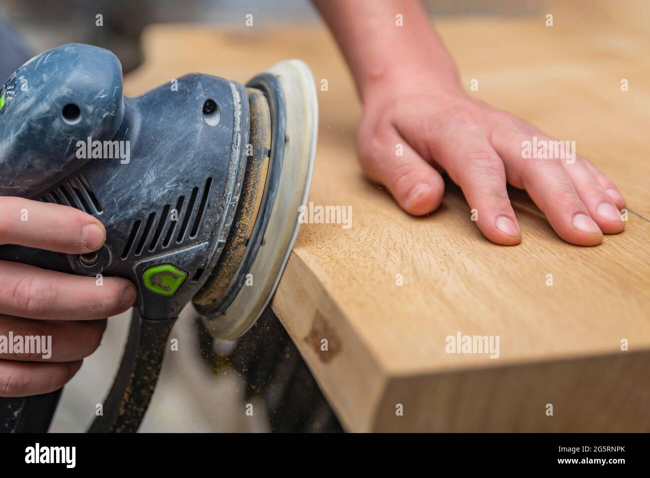 A carpenter works in a Joiner's grinders, furniture