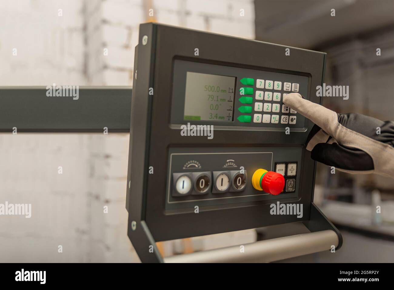 The process of programming a CNC machine. Entering data into a computer