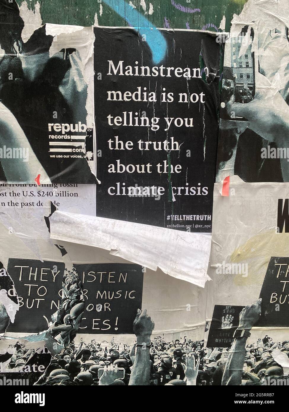 Sign saying the mainstream media is not telling the truth about the real severity of the climate crisis in the world. Stock Photo