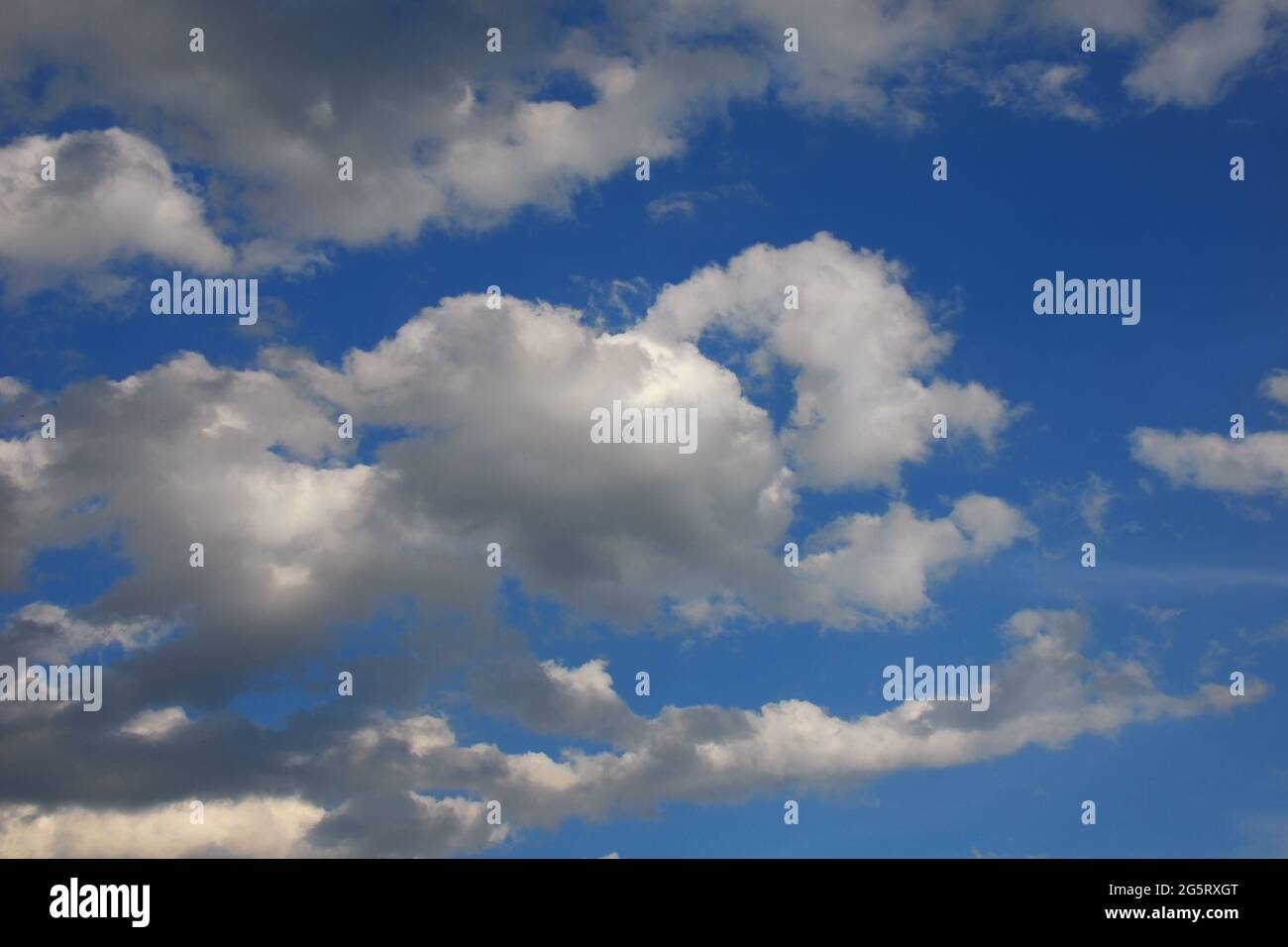 Heavenly blue sky with white clouds as background Stock Photo - Alamy