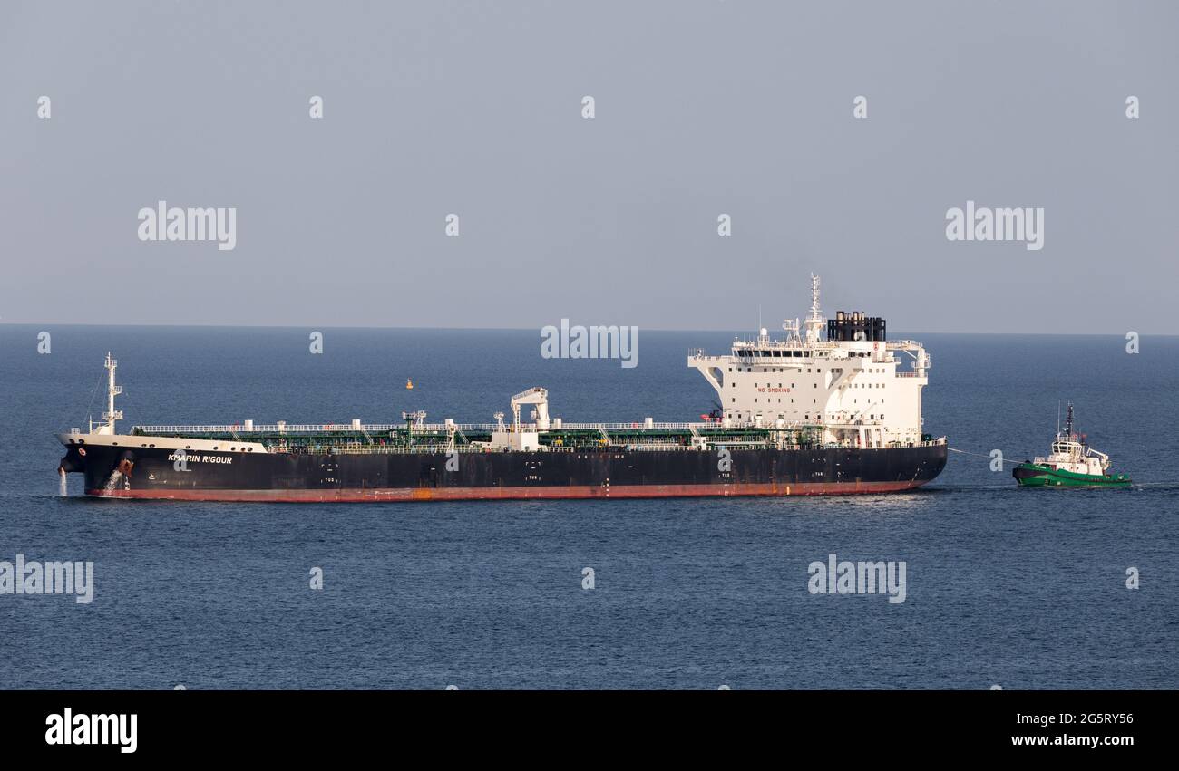 Cork Harbour, Cork, Ireland. 29th June, 2021. Oil tanker Kmarin Rigour approachs Cork Harbour escorted by the tug DSG Titan after a voyage from Corpus Christi Texas with a supply of crude for the refinery at Whitegate, Co. Cork, Ireland. - Picture; David Creedon / Alamy Live News Stock Photo