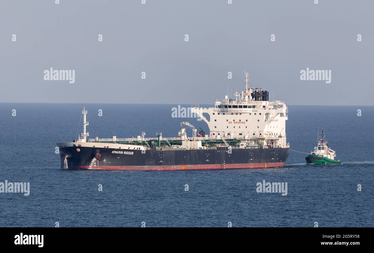Cork Harbour, Cork, Ireland. 29th June, 2021. Oil tanker Kmarin Rigour approachs Cork Harbour escorted by the tug DSG Titan after a voyage from Corpus Christi Texas with a supply of crude for the refinery at Whitegate, Co. Cork, Ireland. - Picture; David Creedon / Alamy Live News Stock Photo