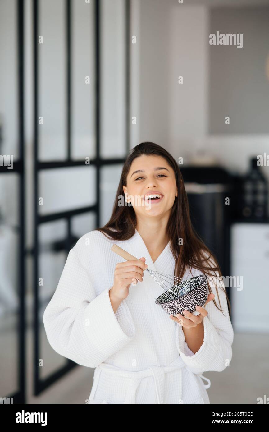 Elegant woman in white robe hi-res stock photography and images - Alamy